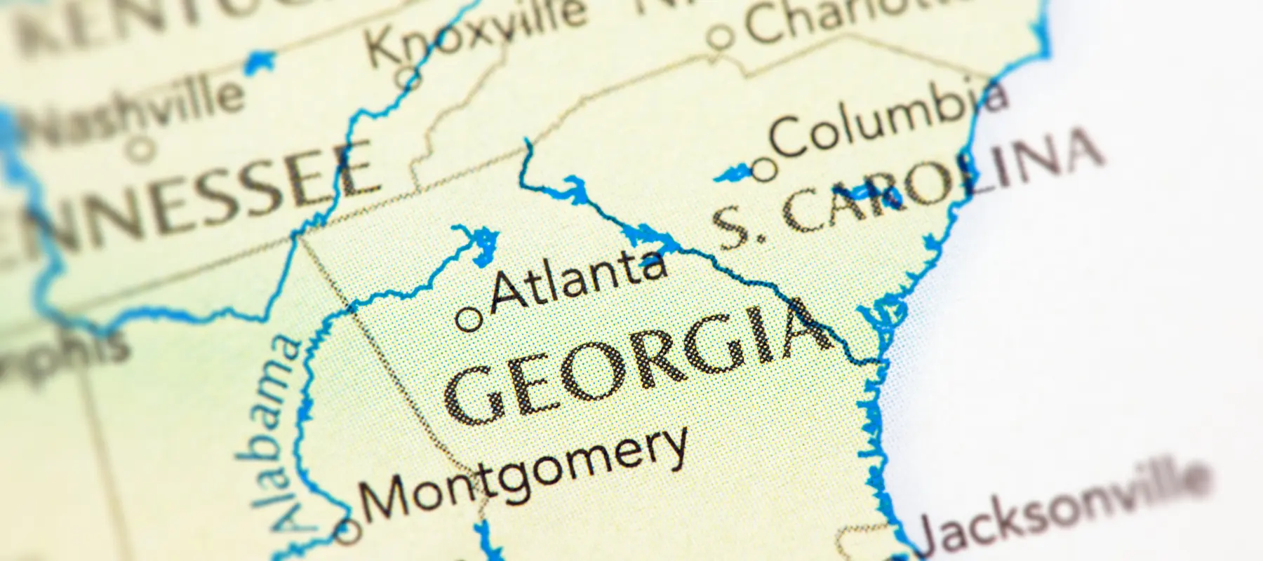 Close-up map highlighting Georgia and its neighbors: Alabama, Tennessee, South Carolina, and part of Florida. Major cities like Atlanta and Montgomery are labeled. Blue lines indicate state borders and rivers.
